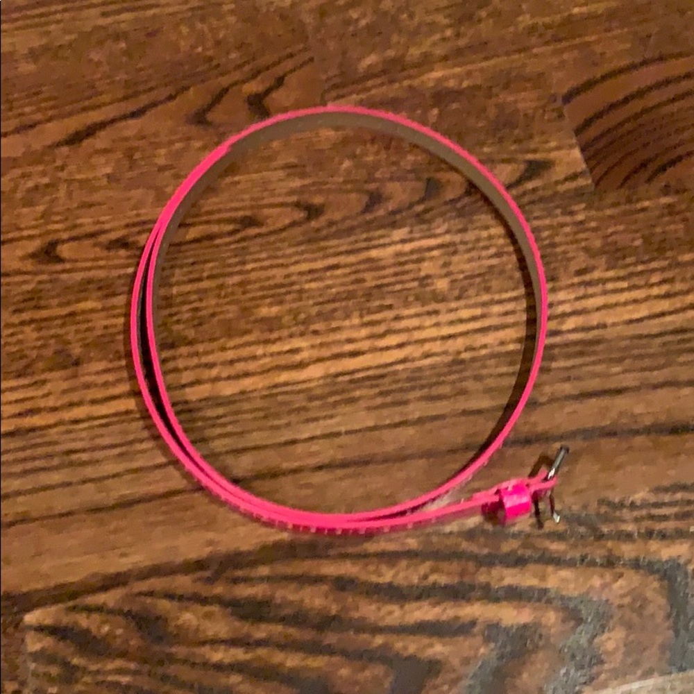 Stylish pink skinny belt
